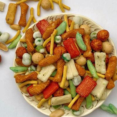 Купить Наградные закуски шутихи риса смешали вкусы с закусками горохов арахисов online manufacture